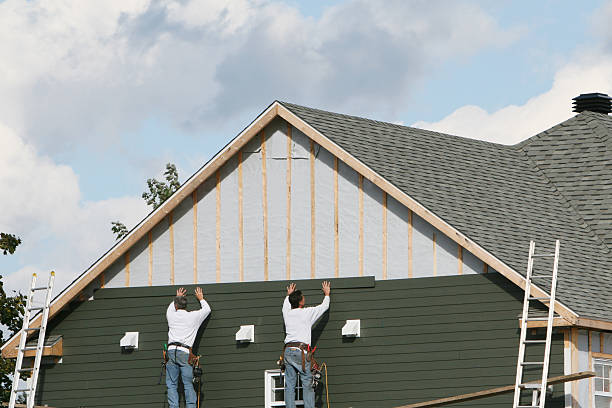 Professional Siding technician working in Plain City, OH